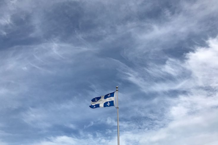 Flag of Quebec waving in the wind