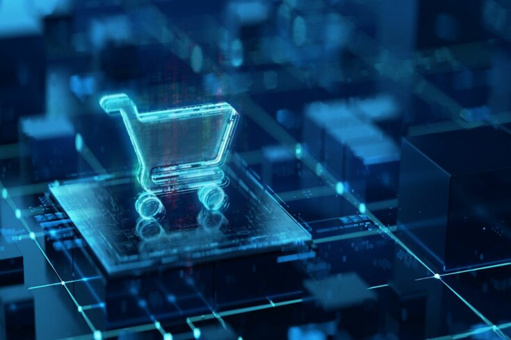 Image of a digital shopping card icon outlined in blue rising off circuit board pattern.