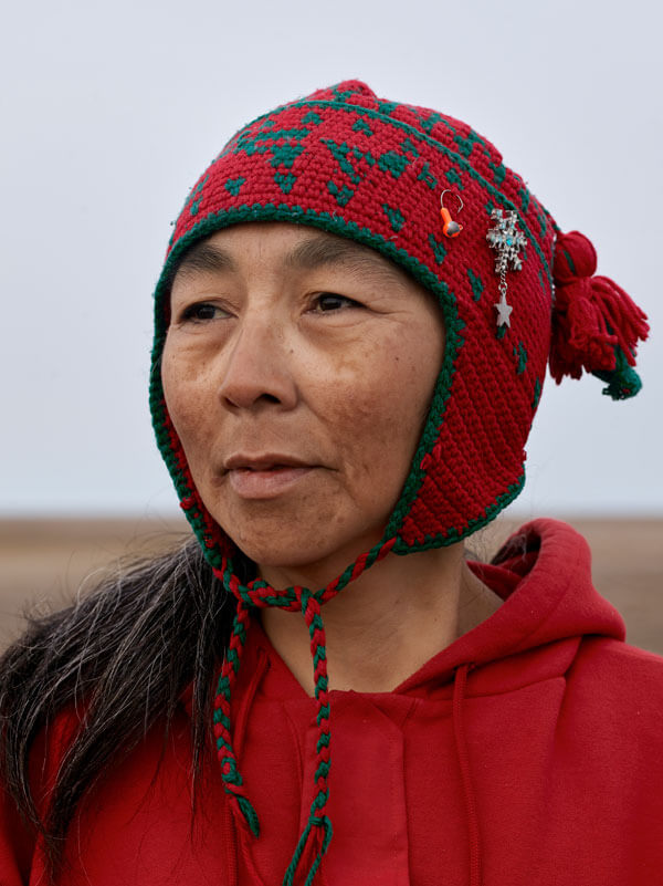 Woman in a red toque.