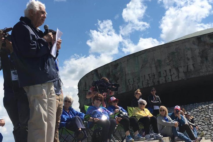 Man giving speech to crowd