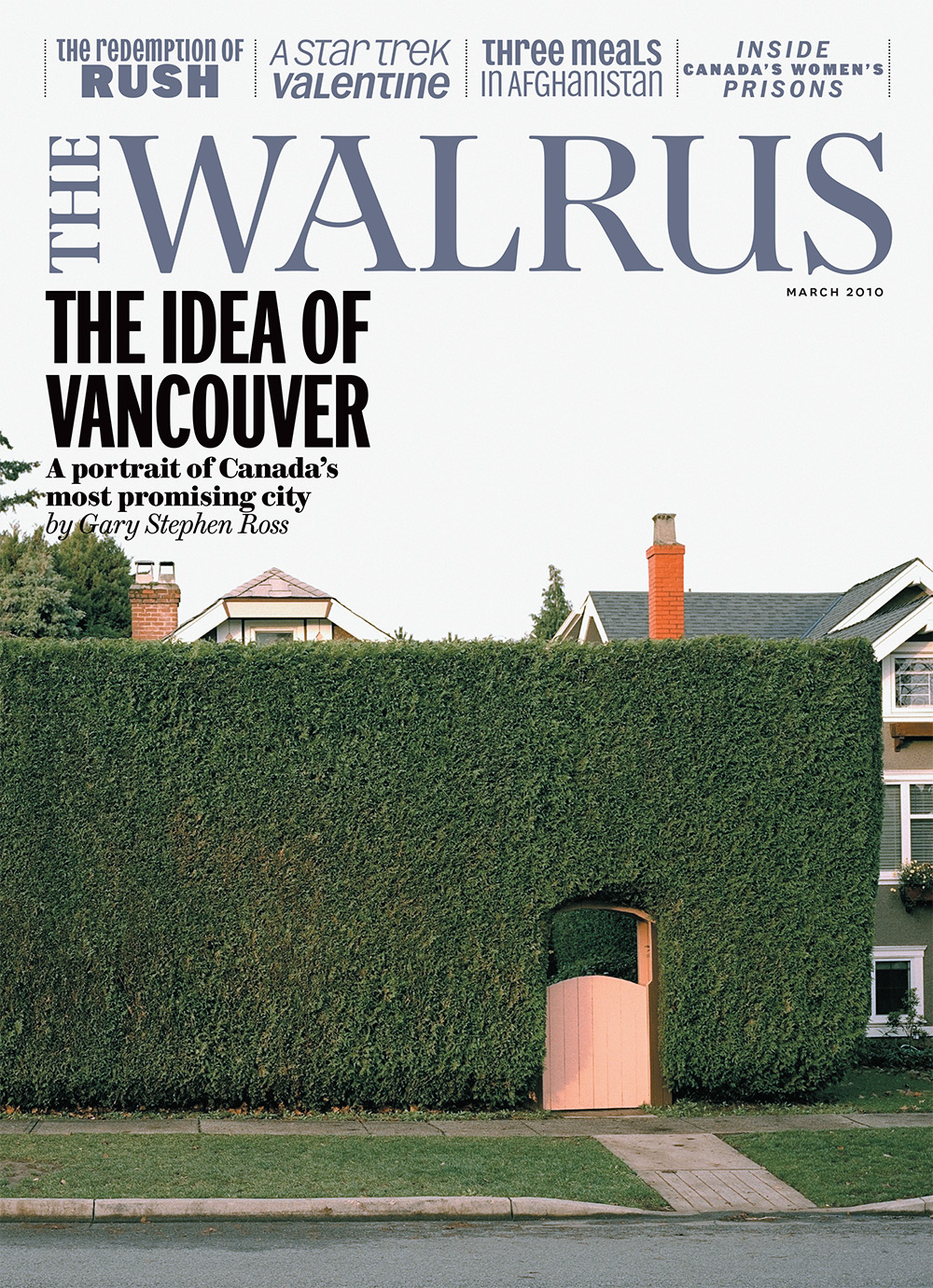 Cover of The Walrus magazine featuring a photo of a door in a large hedge surrounding a house, the top of the roof barely visible. The Walrus wordmark is in blue at the top and the main headline reads 'The Idea of Vancouver.'