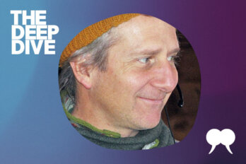 A photo of David Swick surrounded by a blue and purple border. On the upper left corner of the image, it says "The Deep Dive" in white lettering. On the bottom right corner of the image, it is a white tusk logo from The Walrus.