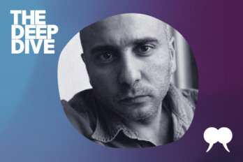 A photo of Rawi Hage surrounded by a blue and purple border. On the upper left corner of the image, it says "The Deep Dive" in white lettering. On the bottom right corner of the image, it is a white tusk logo from The Walrus.