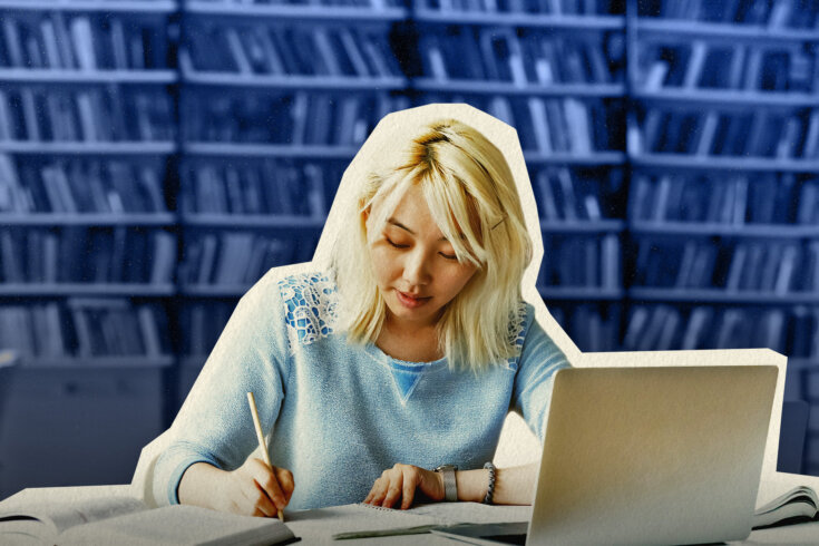 A photo illustration of a student writing and using a laptop in a library.
