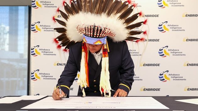 Frog Lake First Nation Chief Greg Desjarlais takes part in a signing ceremony between Enbridge and 23 Indigenous communities for equity ownership in seven oil sands pipelines. Photo courtesy Enbridge