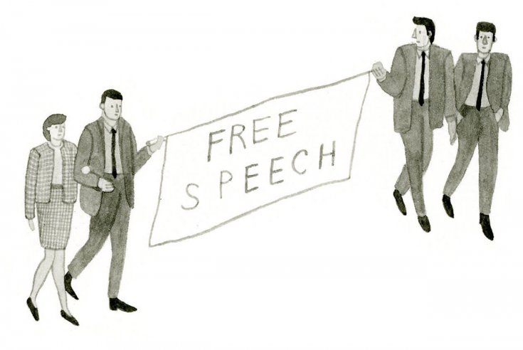 Students dressed in 1960s clothing hold a sign that reads free speech.