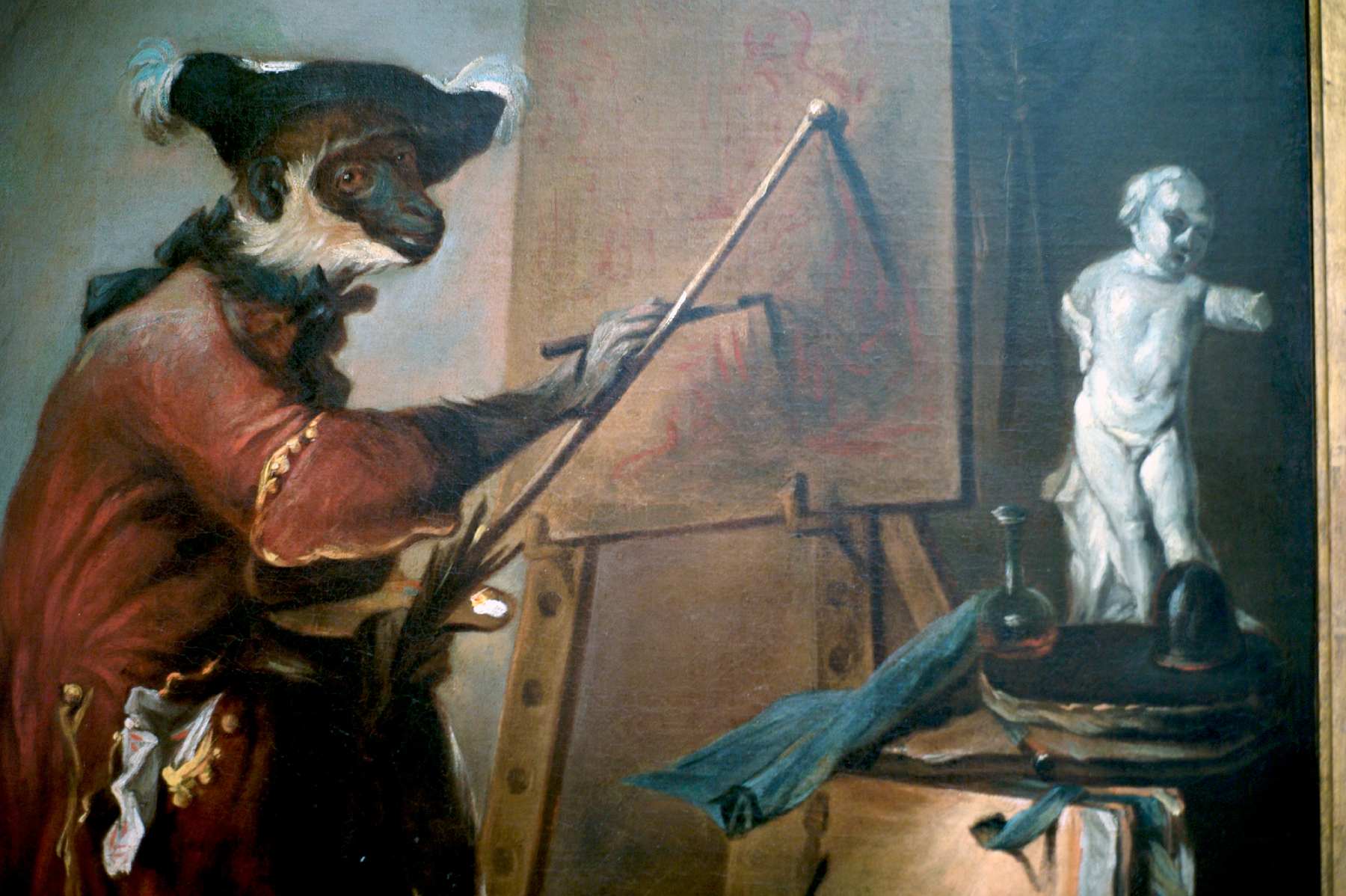 Photo of a piece of art depicting a monkey dressed in clothes and ...