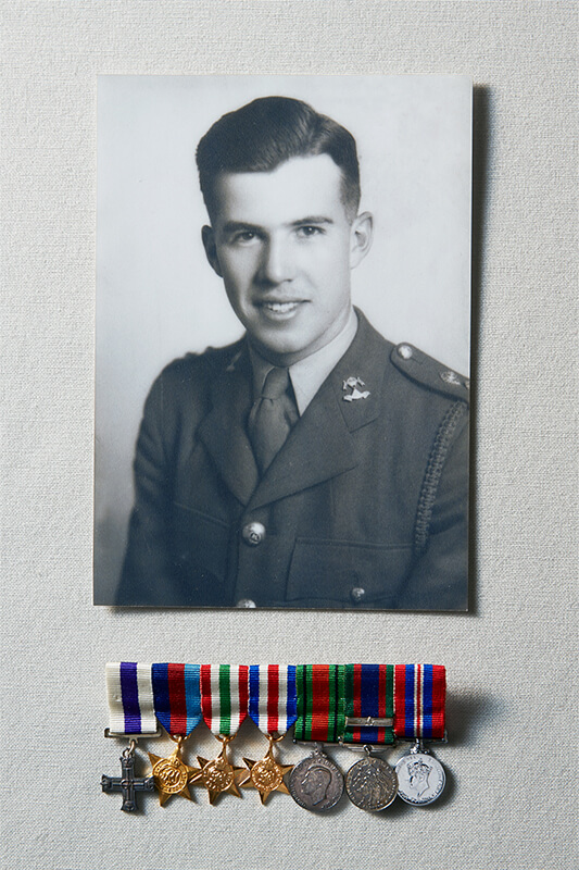 Portrait of Harry Ward Macdonald with medals.