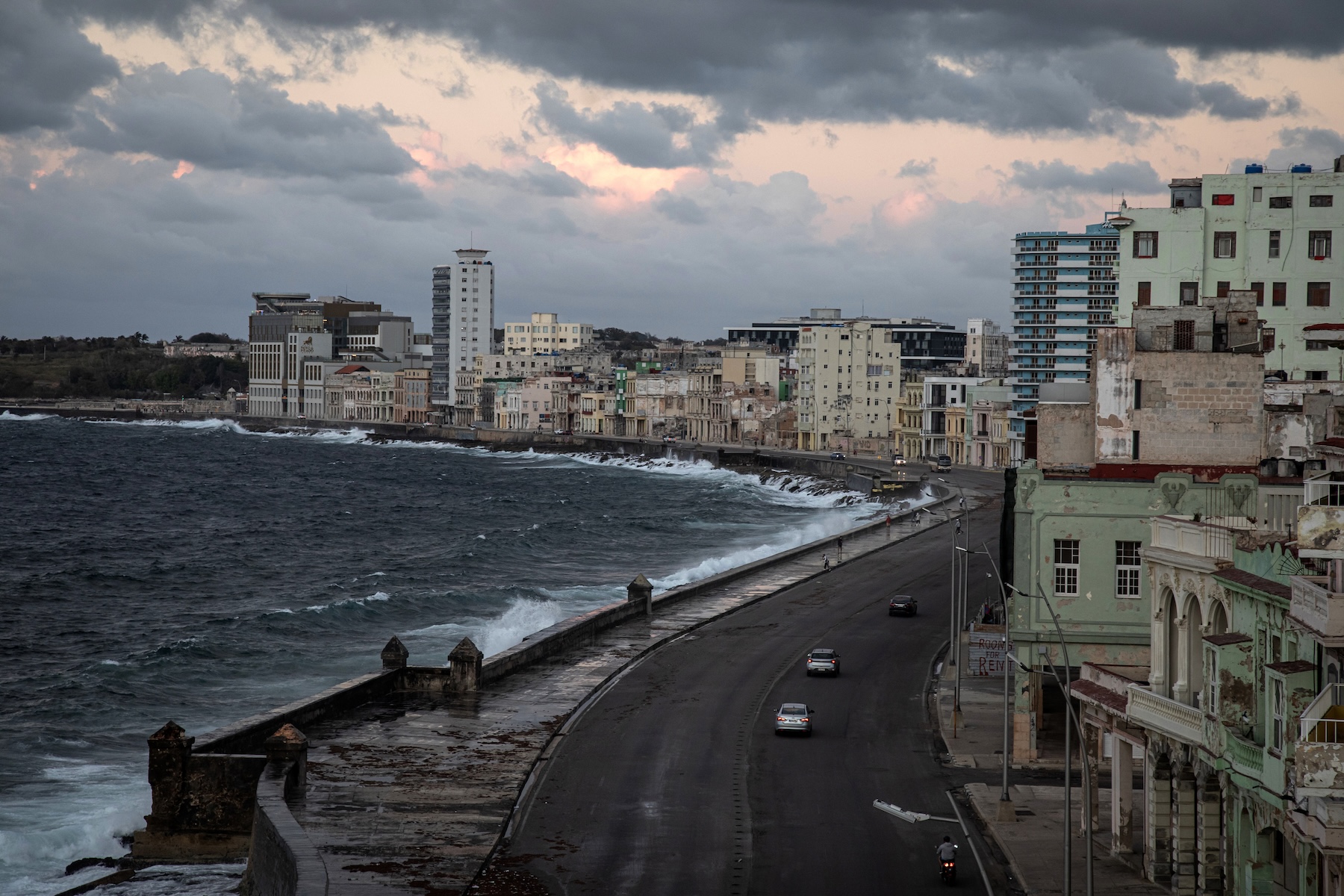 A photo of a city driving along a coastal highway with only three cards visible.