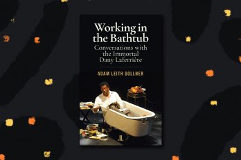 The cover of "Working in the Bathtub," which depicts the writer, Dany Laferrière, lying in a bathtub fully clothed.