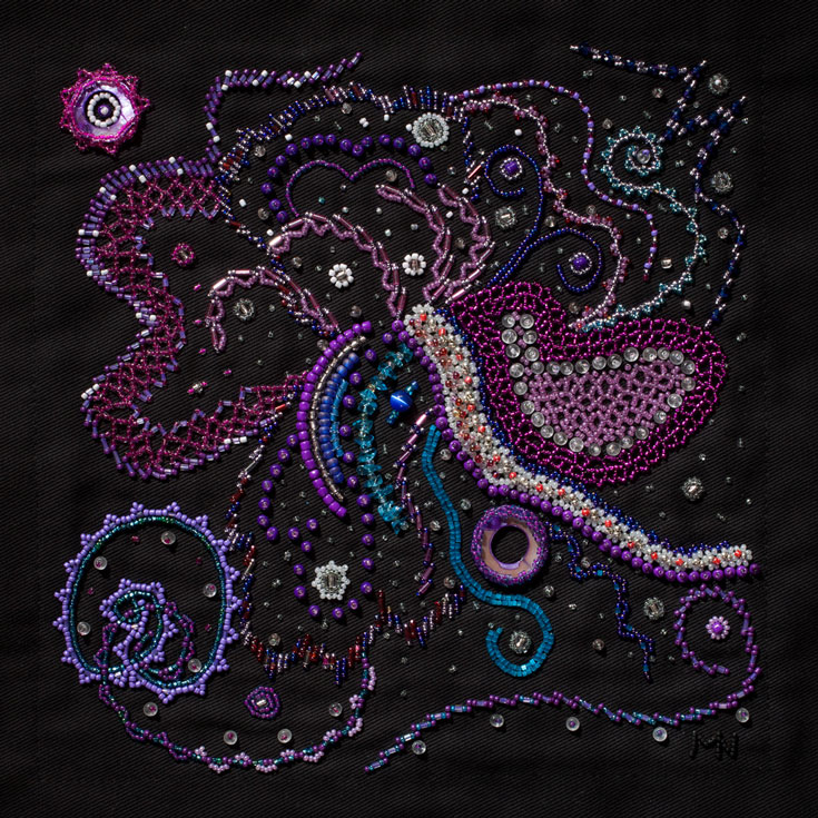 A galaxy rendered in purple beadwork.