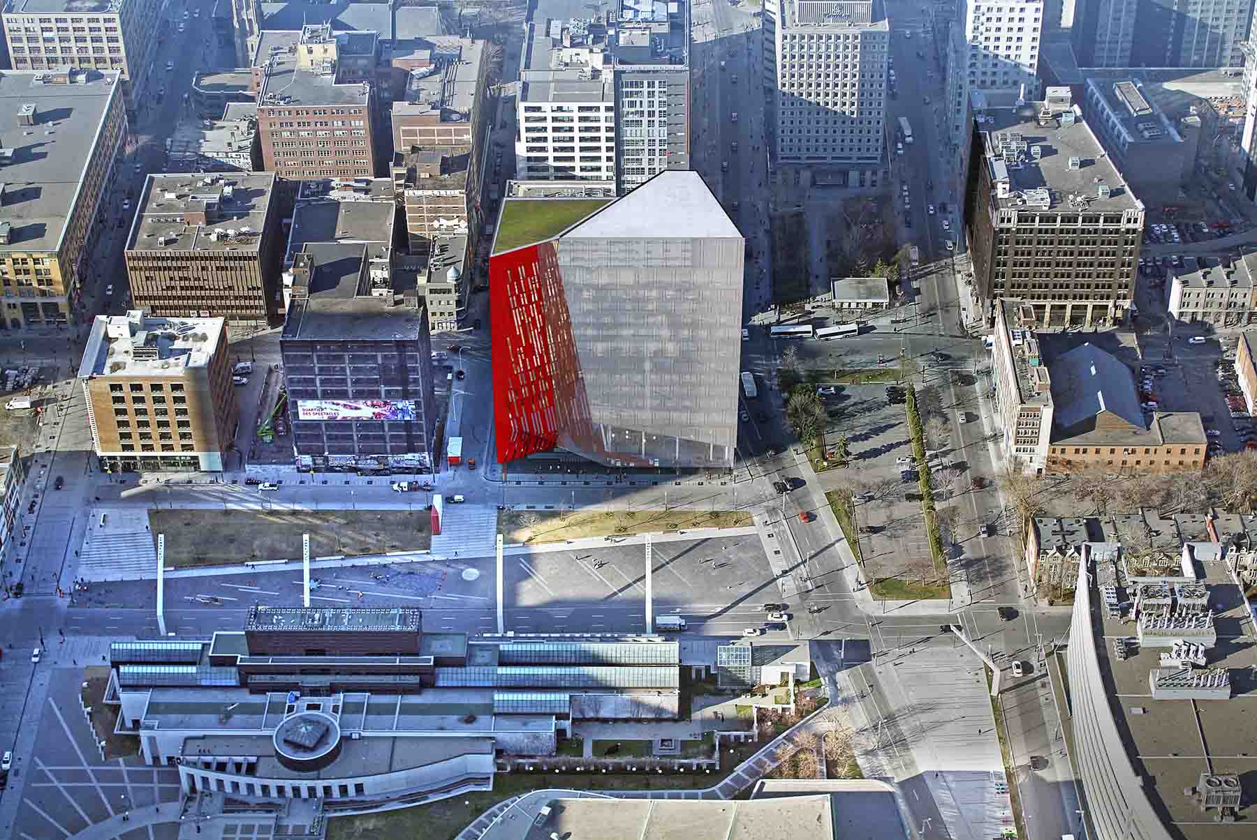 An aerial view of Montreal with the Balmoral building model, which is partially clad in red 