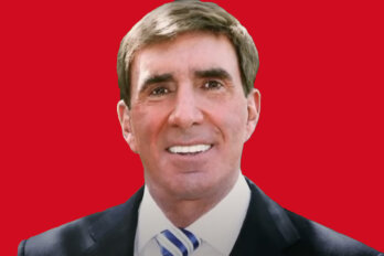 A photo of Robert Miller against a red background