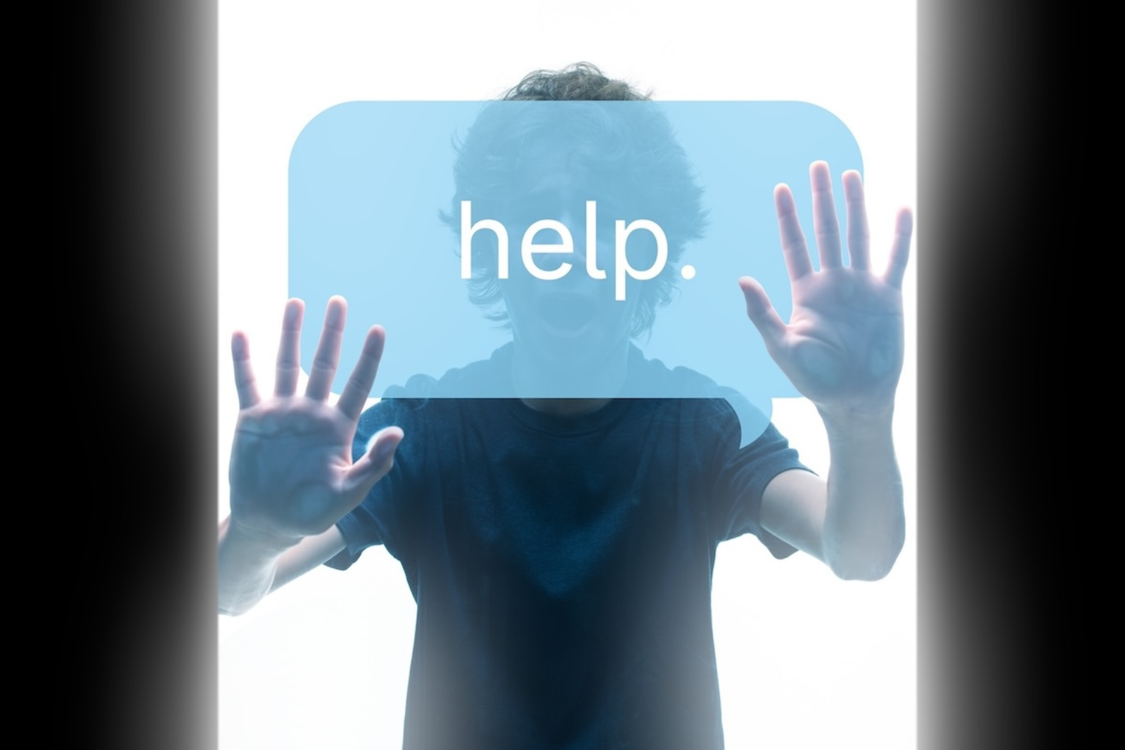 Image of a child obscured in shadow in a lit-up white phone screen with a blue text bubble message which reads Help in front of him.