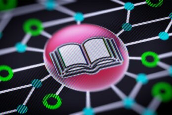 A photo of a book icon on a screen within a circuit board.