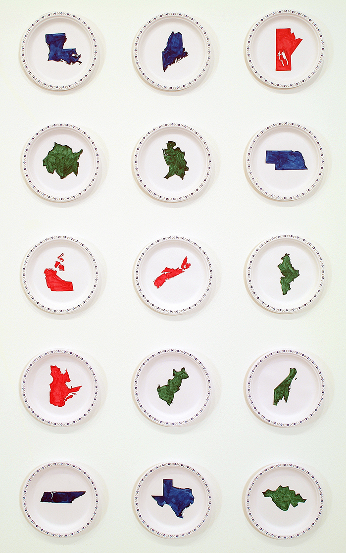 Photo of disposable dinner plates arranged in rows. Each plate is painted with the silhouette of a Canadian province or US or Mexican states.