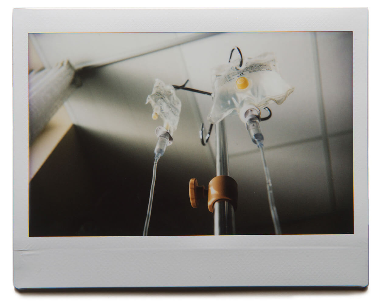 "Balloons all filled with rain / As children's eyes turn sleepy-mean" ("Fiddler's Green") IV bags hang in a patient room at the Sault Area Hospital in Sault Ste. Marie, Ontario. Downie’s young nephew Charles Gillespie died of heart disease before “Fiddler’s Green” was recorded, and these lyrics are thought to describe IVs in a children's ward. The emotional song wasn’t played live until fifteen years after its release, in 2006.