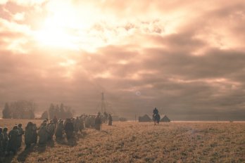 Still from the TV Show "The Handmaid's Tale" showing group of women walking in radioactive field