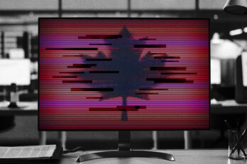 A photo illustration of a computer monitor. The image of a maple leaf is blurred and pixelated