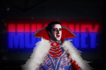 Image of a man dressed in an elaborate stage costume in front of the name Mulroney written in red and blue text.
