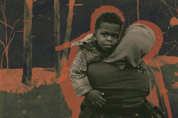 Photo of a migrant facing away from the camera holding a toddler against an orange and grey background.