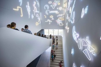 Pae White's Lucky Charms (2014/2017) is installed between levels two and three of the Remai Modern.