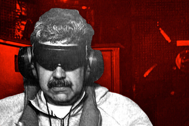 Image of Venezuelan president Nicolás Maduro blindfolded and wearing noise-cancelling headphones against a red background.
