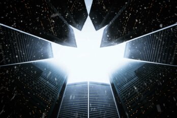 A maple leaf shape created against the sky with a cluster of high-rises coming together at the top